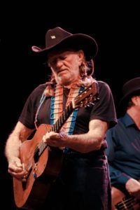  Singer-songwriter Willie Nelson, performing during the Country Throwdown Tour in 2011
